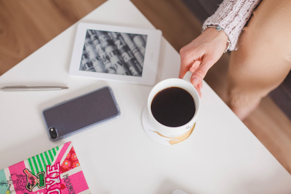 working with a cup of coffee